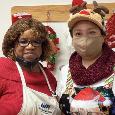 Staff and volunteer during Holiday festivities