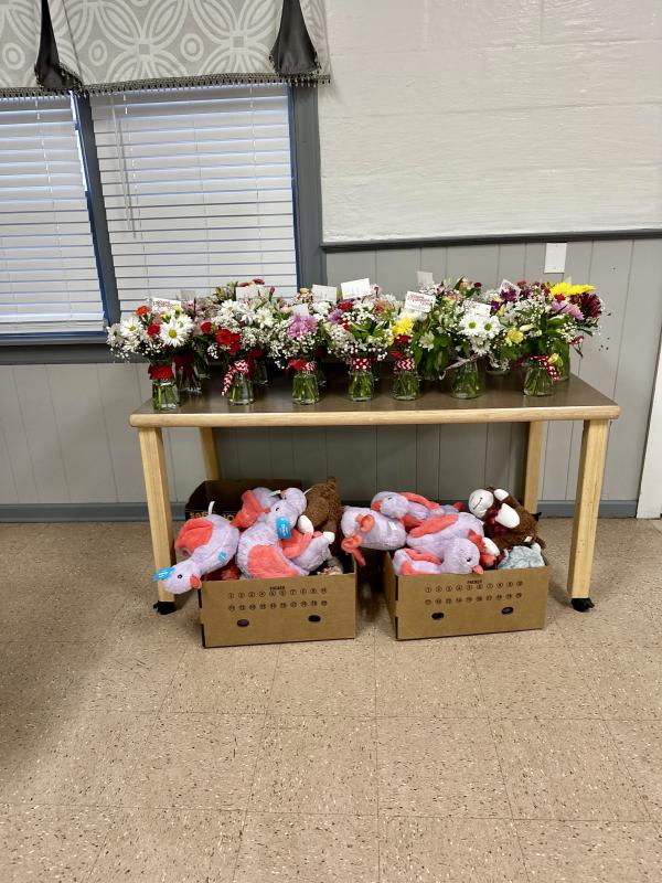 Mom's Wishing Widows Well donated 50 beautiful floral arrangements to Apex homebound seniors.