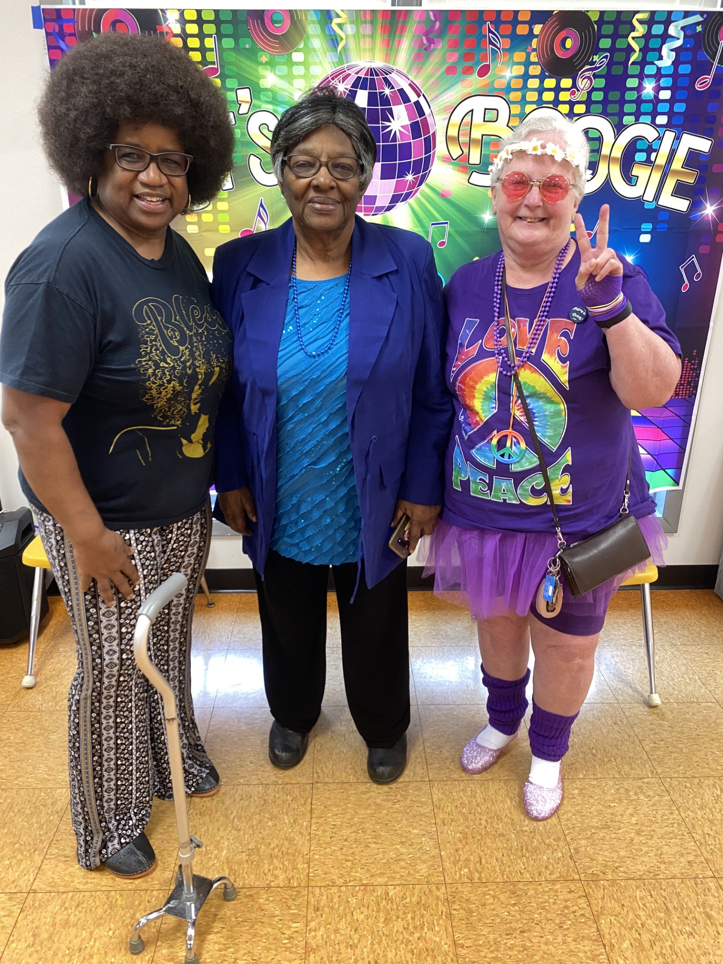 Very groovy! Seniors at the Wendell Friendship Cafe celebrate like it's 1974 to honor our 50th Anniversary!